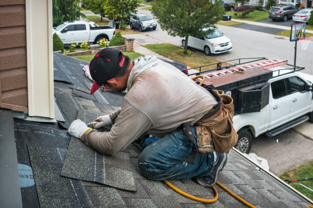 Professional Storm Damage Roof Repair technician working in Ramah, CO